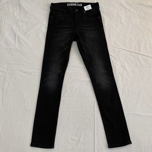 H&M black stretch skinny jeans, new with tags, kids size 13-14 Y, extreme flex